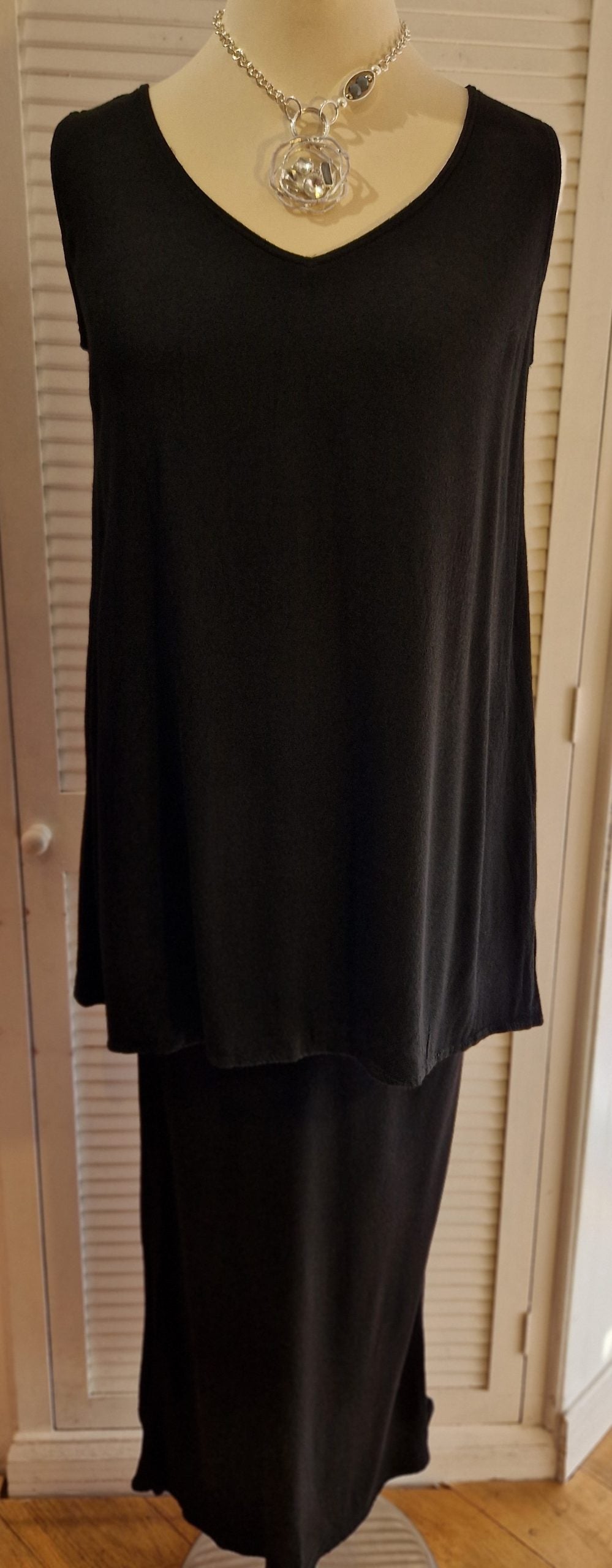 Our mannequin is modelling Belladonna crepe bias cut skirt in black for Froxx Clothing