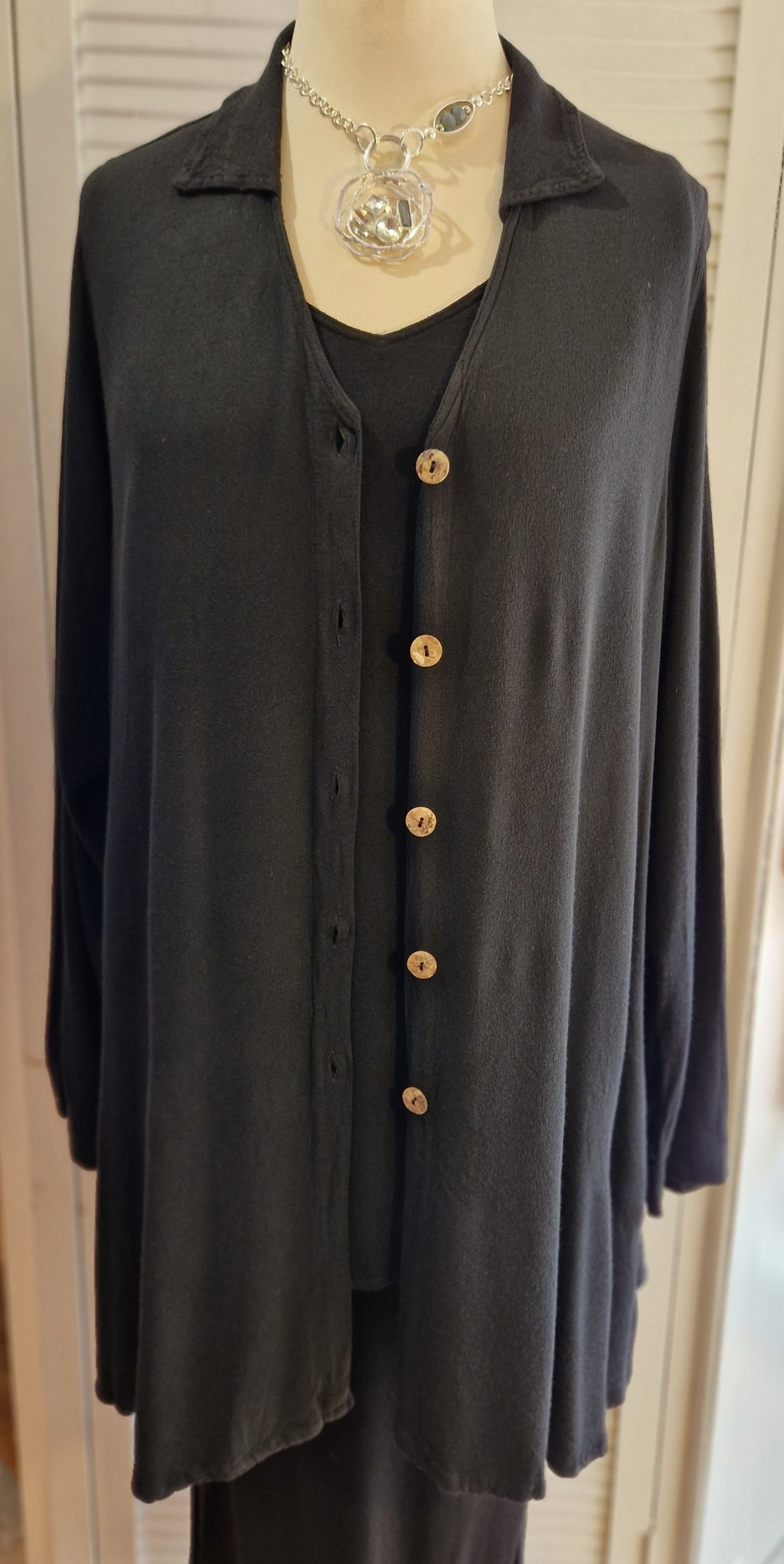 Our mannequin is wearing Belladonna crepe jacket with collar in black for Froxx Clothing