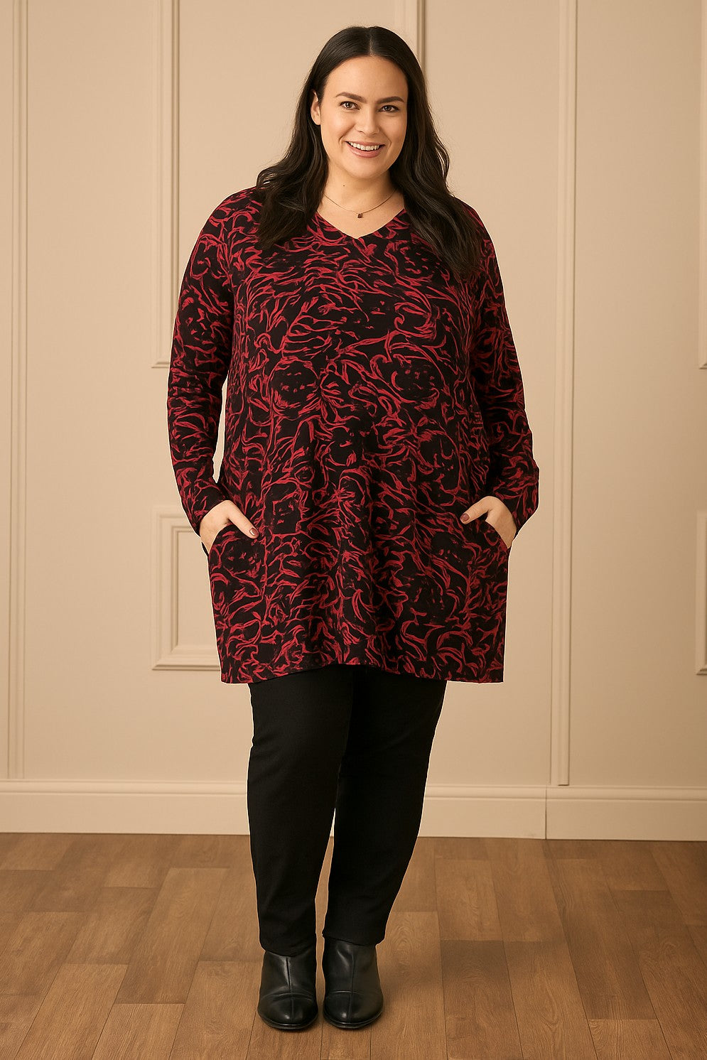 OUr model Zhana Paton is wearing Ciso floral tunic in black and red for Froxx Clothing plus size specialists