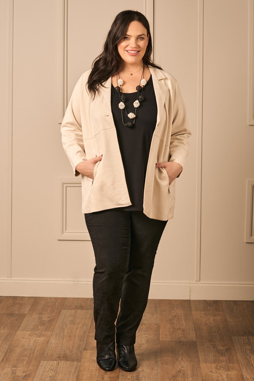 Our model is wearing Via Appia faux suede jacket in ivory for Froxx Clothing plus sizes