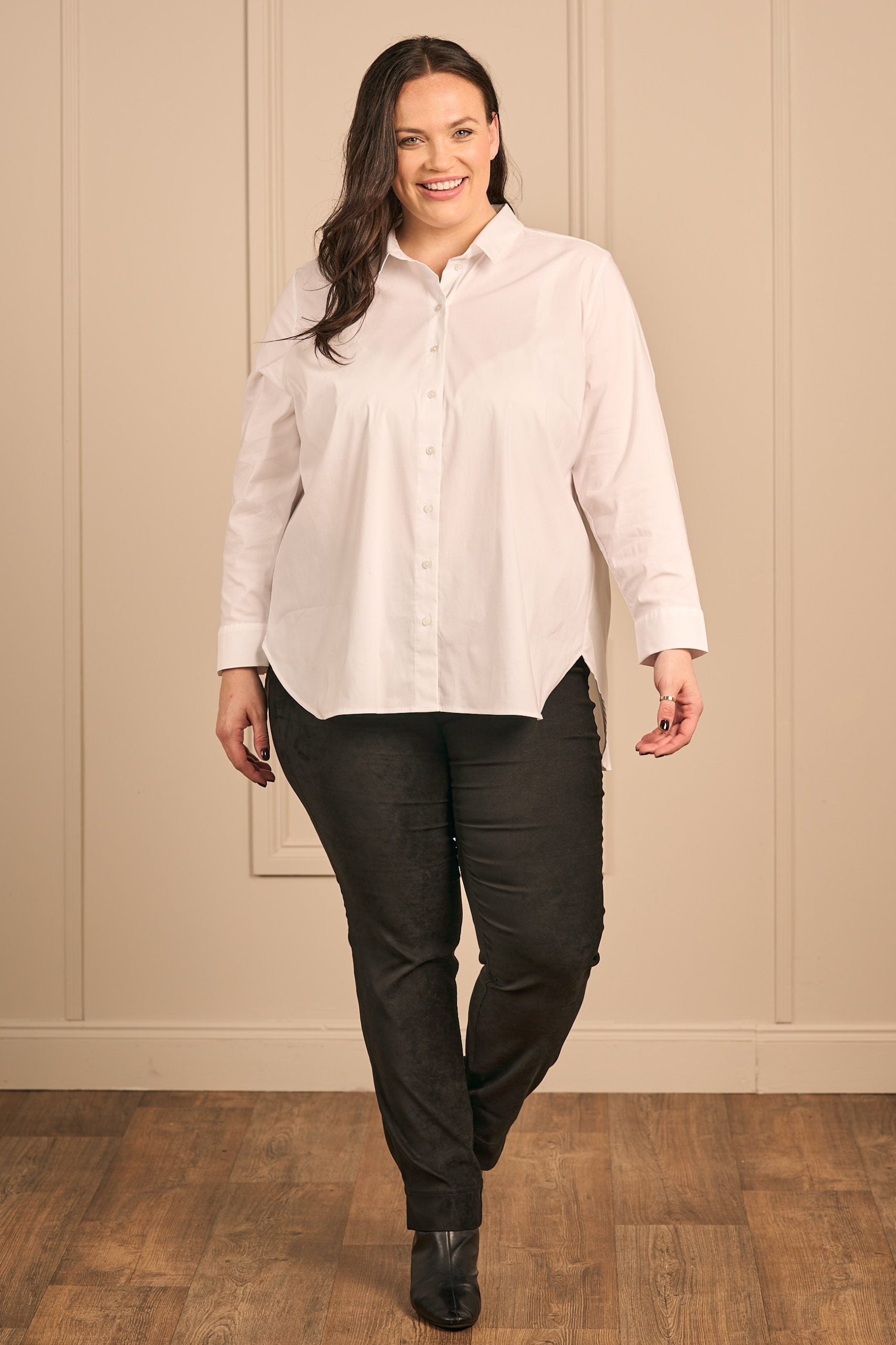 Our model is wearing Via Appia stretch shirt in white for Froxx Clothing plus sizes