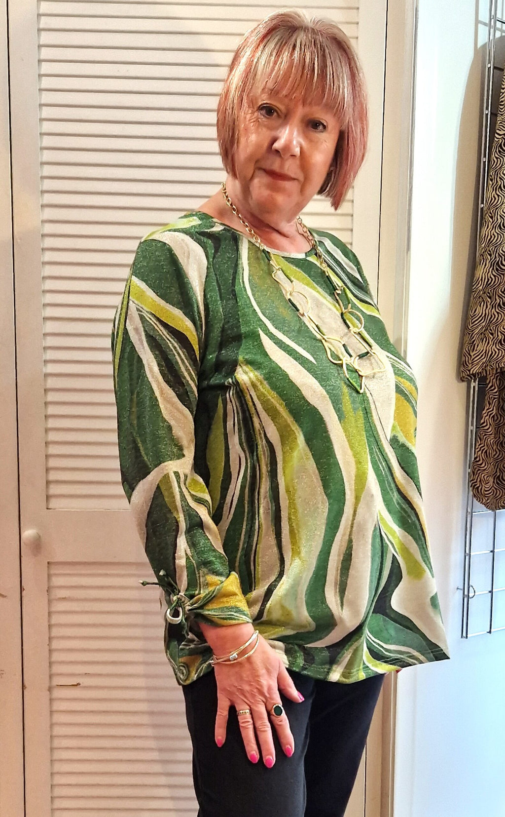 Model is wearing See You lurex top in green for Froxx Clothing plus sizes