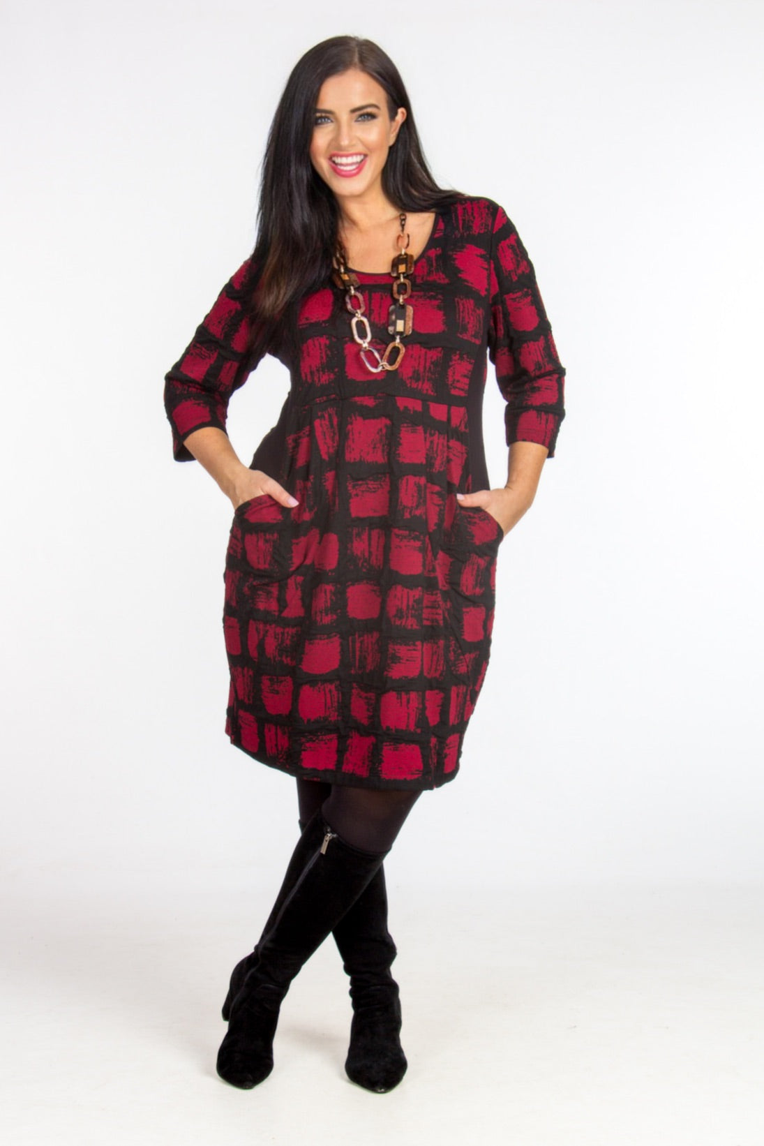 Our model is wearing Pont Neuf Bianco jersey dress in deep red and black for Froxx Clothing