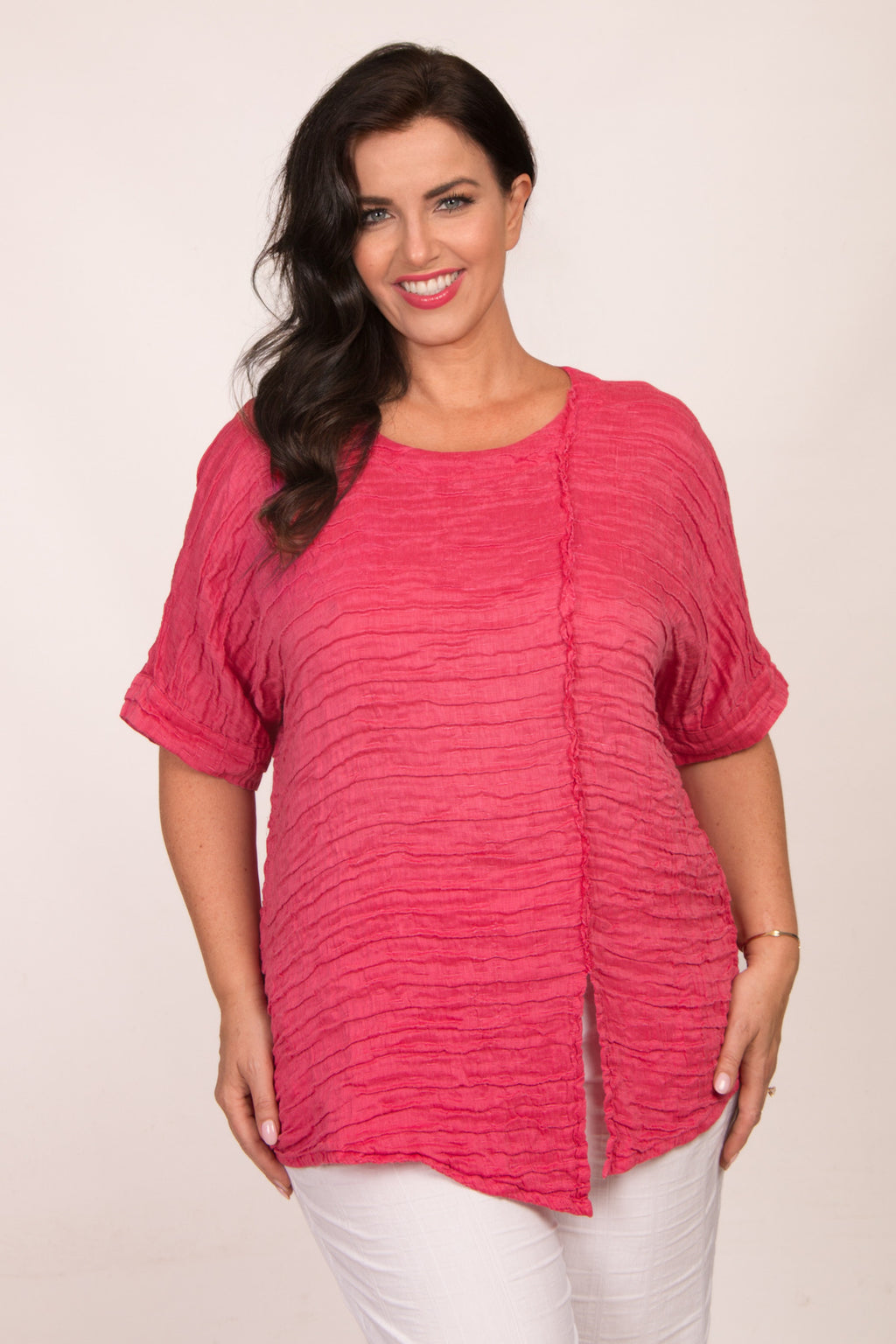 Our model is wearing Grizas frill detail short top in raspberry for Froxx Clothing plus sizes