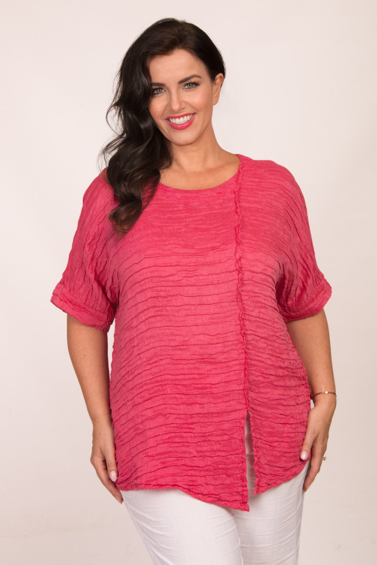 Our model is wearing Grizas frill detail short top in raspberry for Froxx Clothing plus sizes