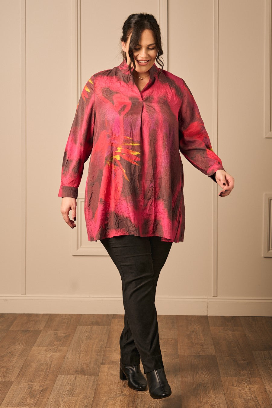 Our model is wearing Noen print tunic in red for Froxx CLothing plus sizes