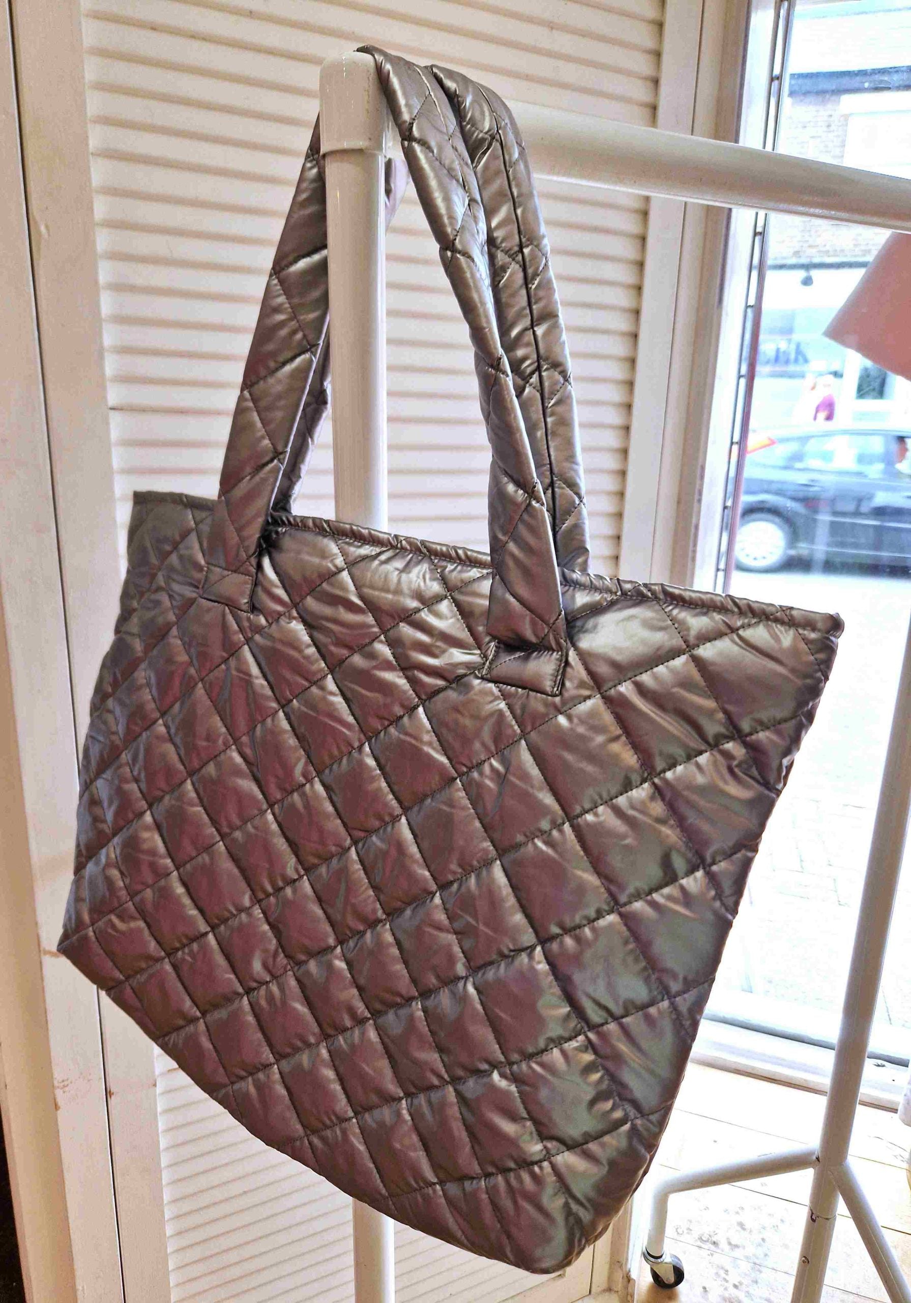 Our picture is showing AKH quilted bag in silver for Froxx Clothing plus sizes