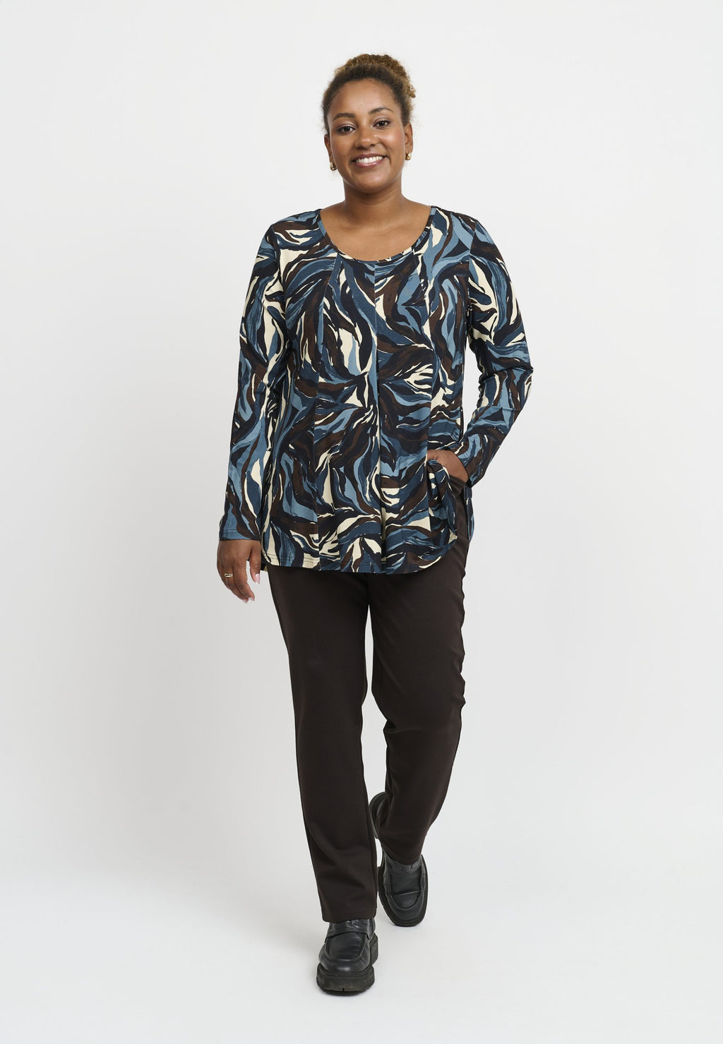 Our model is wearing Pont Neuf Elvira A line tunic in blue for Froxx Clothing plus sizes