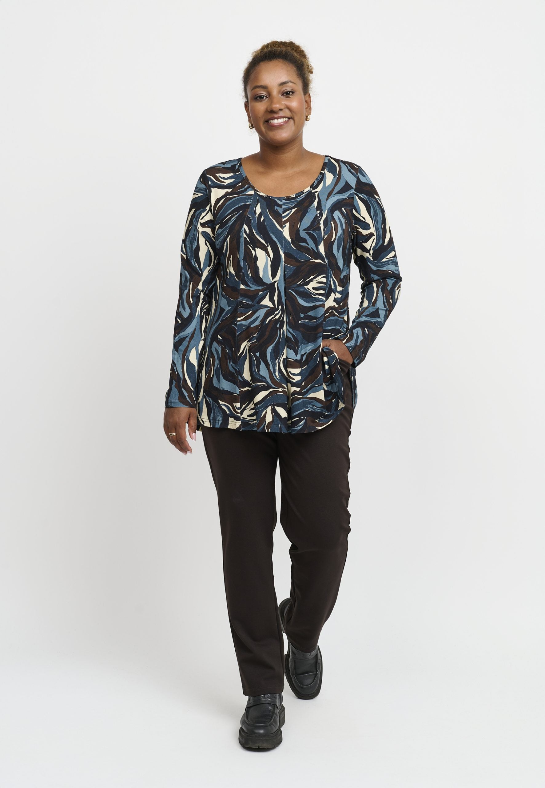 Our model is wearing Pont Neuf Elvira A line tunic in blue for Froxx Clothing plus sizes