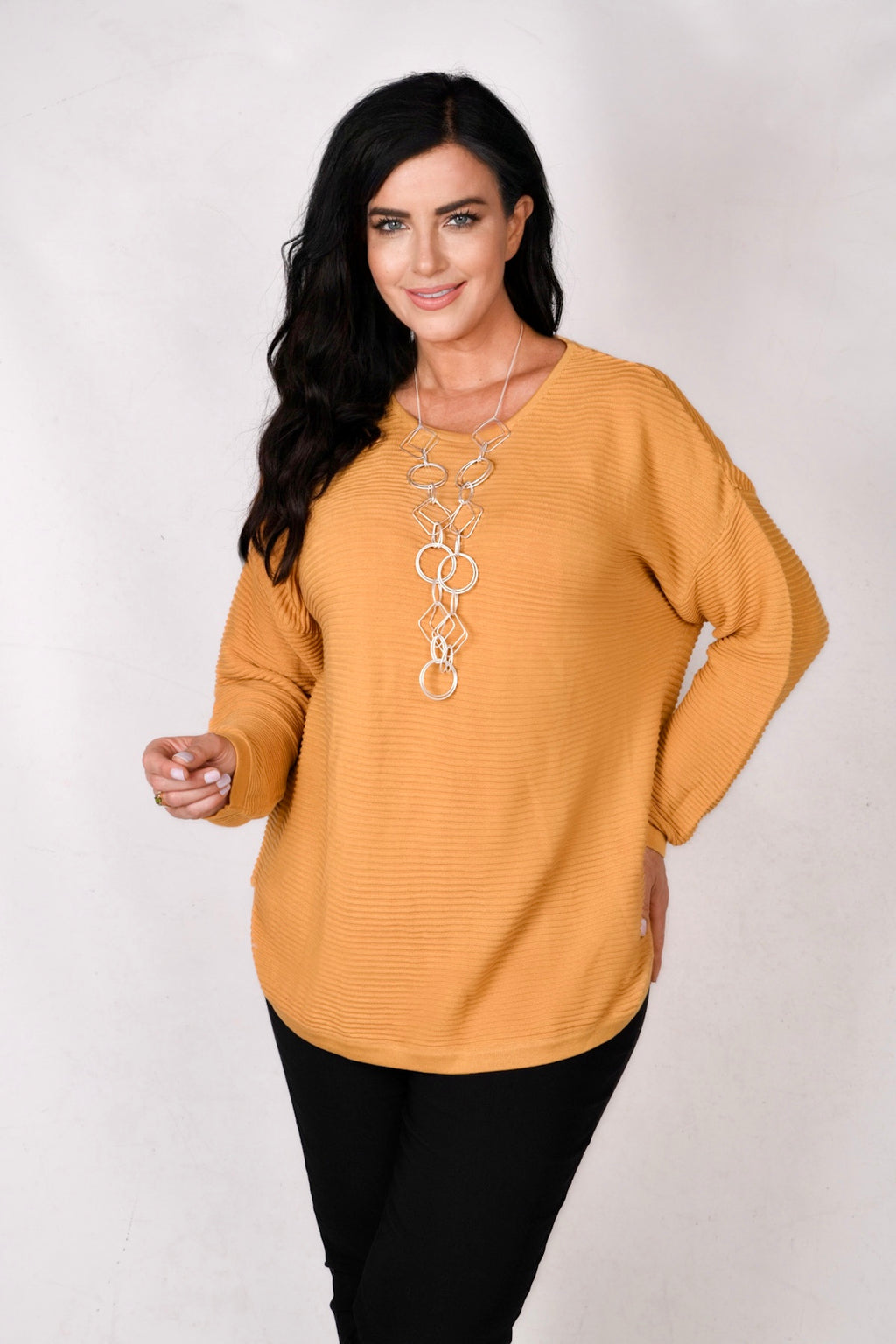 Model is wearing Orientique rib jumper in lemonite for Froxx Clothing plus sizes