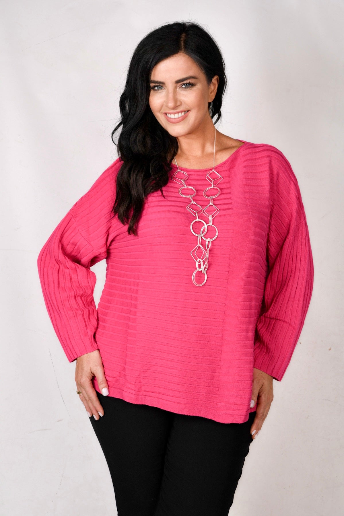Model is wearing Doris Streich rib jumper in fuchsia pink for Froxx Clothing Plus sizes