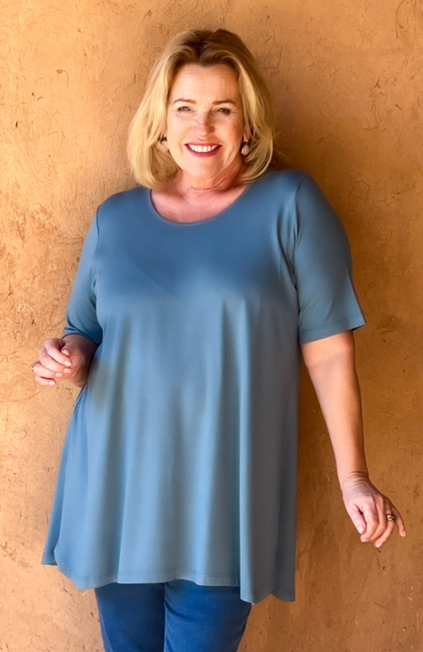 model is wearing Kasbah Tuscany jersey tee in soft teal for Froxx Clothing plus sizes