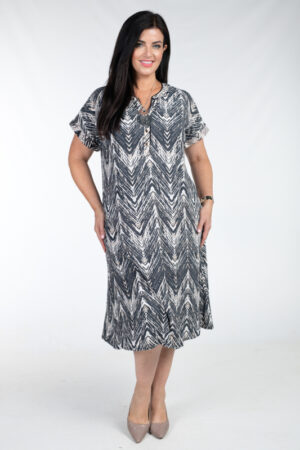 Model is wearing Ciso zig zag dress in navy for Froxx Clothing plus sizes