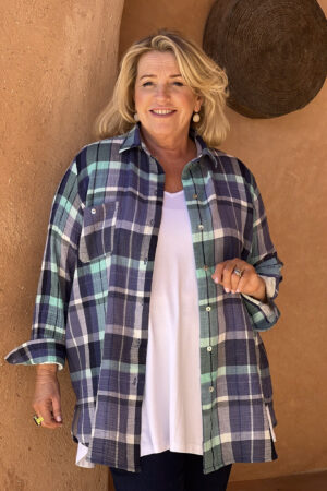 Our model is wearing Taylor cotton check shirt in blue by Kasbah CLothing for Froxx Clothing plus sizes
