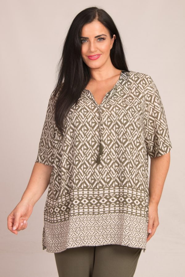Our model is wearing KJ Brand Aztec tunic in khaki and ecru for Froxx Clothing plus sizes