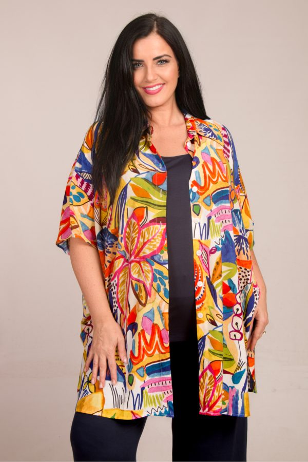 Our model is wearing Mona Lisa batwing shirt in Mustard for Froxx Clothing