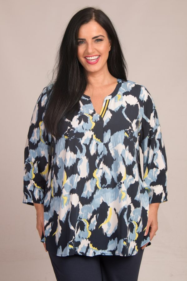 our model is wearing Via Appia abstract tunic in indigo and lemon for Froxx Clothing plus sizes