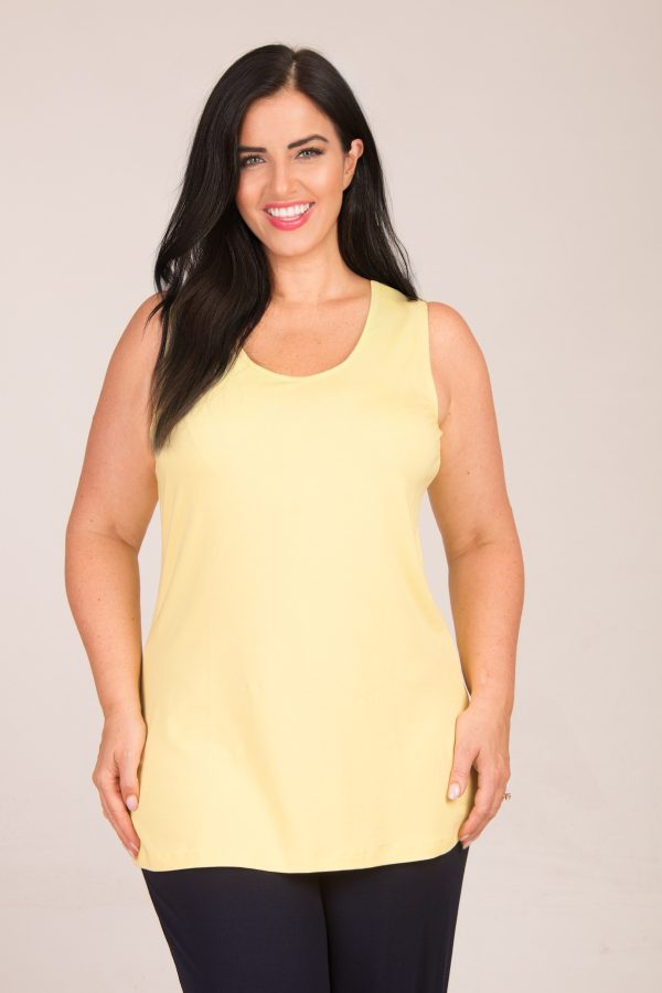 Our model is wearing See You plain jersey vest in citron for Froxx Clothing Plus sizes
