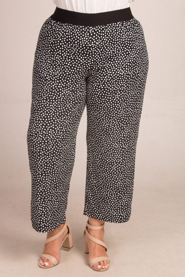 OUr model is wearing See You jersey crop palazzos in black white spots for Froxx CLothing plus sizes