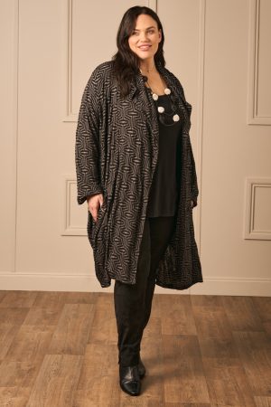 Our model is wearing AKH Vanessa jacquard jersey jacket in black for Froxx CLothing plus sizes