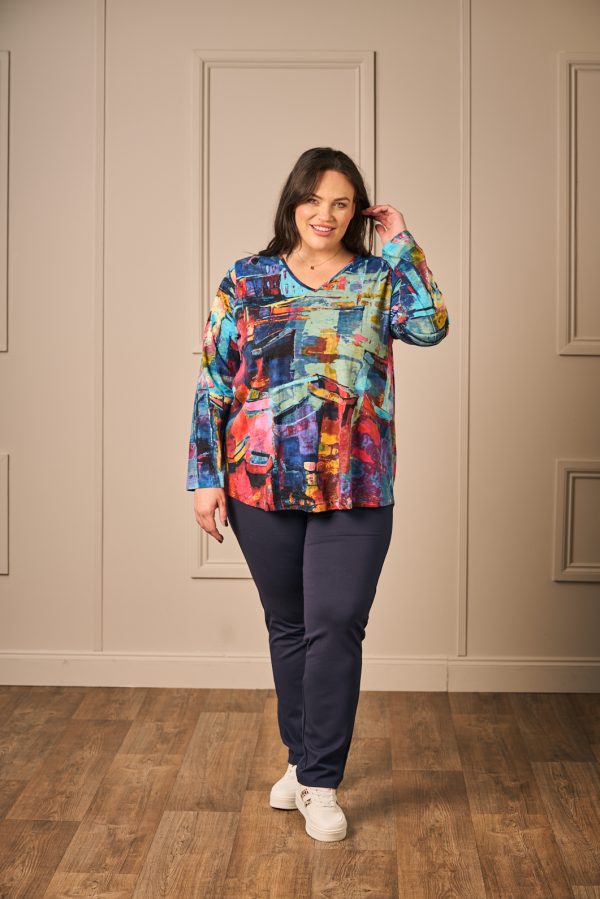 Our model is wearing Orientique V neck tee in blue pink for Froxx Clothing plus sizes