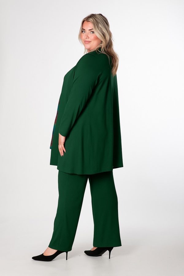 OUr model is wearing Exelle Buto jersey trousers in forest green for Froxx Clothing plus sizes