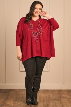 Our model is wearing Thanny batwing jumper in red for Froxx clothing plus sizes