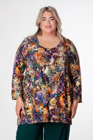 The Exelle model is wearing Exelle Trozoni jersey tunic tee in multicolours for plus size specialists Froxx CLothing