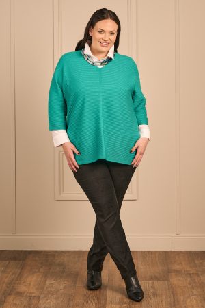 Our model Zhana is wearing VIa Appia V neck jumper in emerald for Froxx clothing plus size specialists
